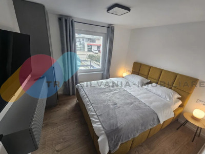 Apartament cu parcare și curte -  zona Bună Ziua